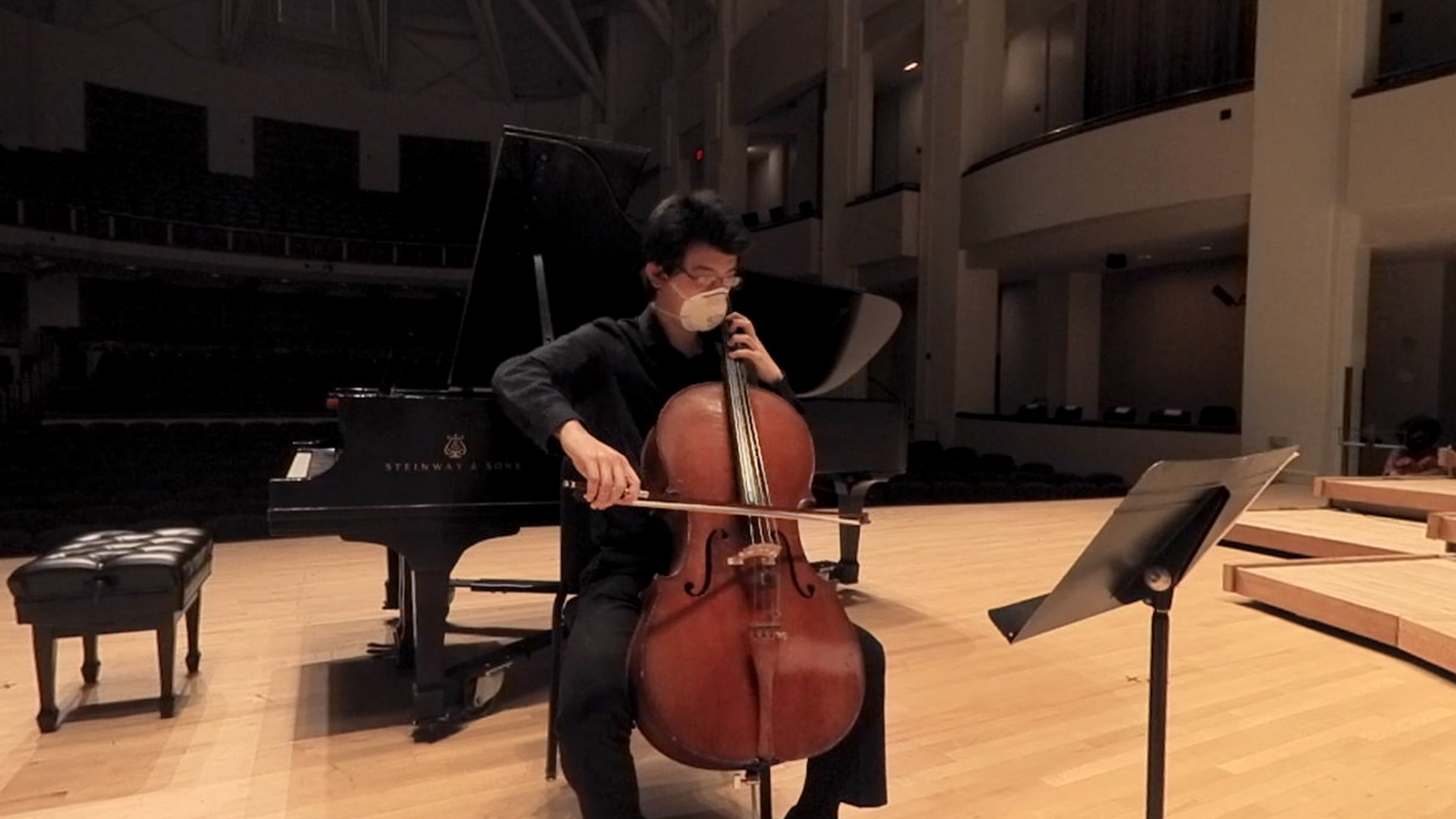  Music student Michael Li playing the cello at The Clarice for Yo-Yo Ma watching virtually.