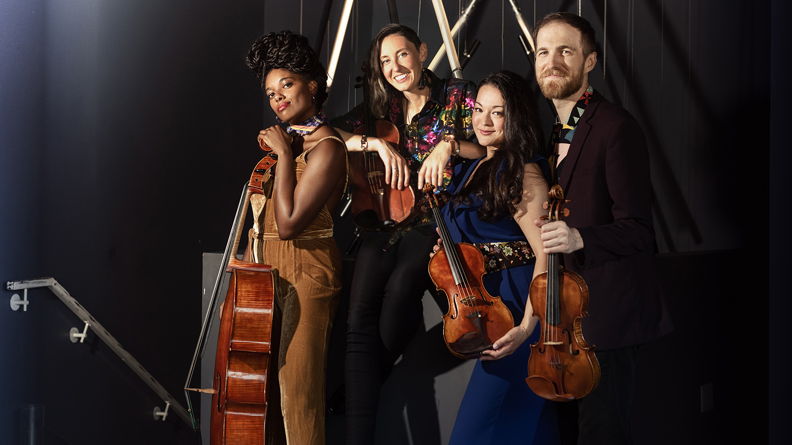 Thalea String Quartet, from left to right: Titilayo Ayangade with a cello, Lauren Spalding with a viola, Kumiko Sakamoto with a violin, and Christopher Whitley with a violin.