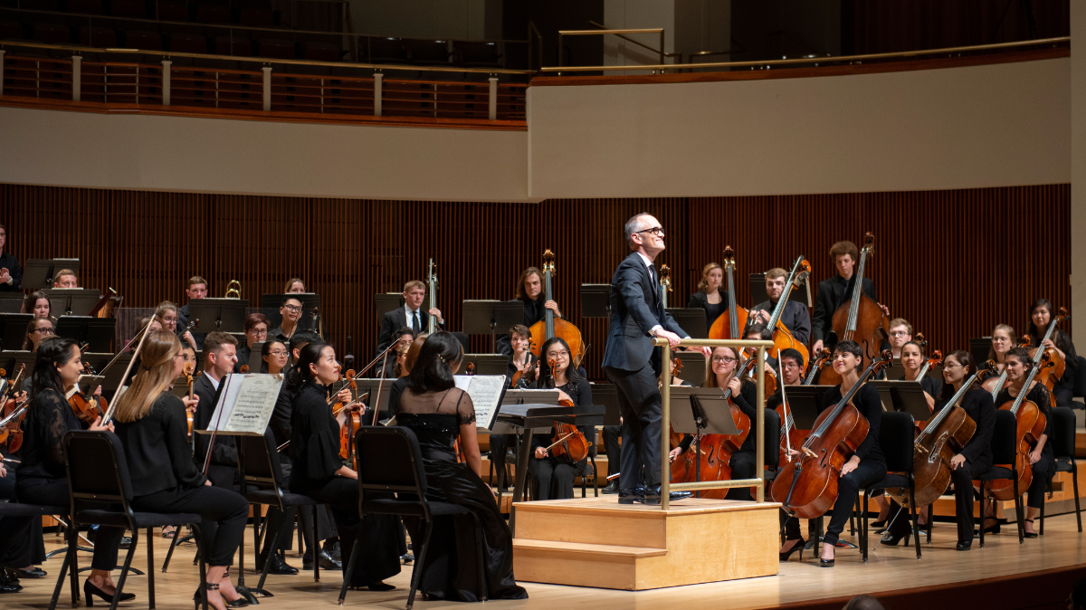 UMD Symphony Orchestra performs on stage.