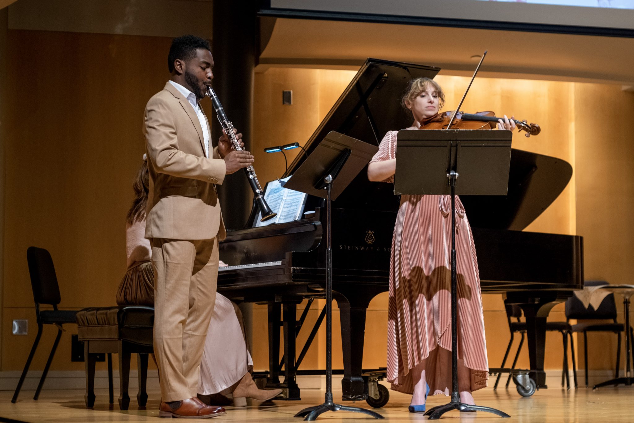  Sum-Yi Tang (piano), Terrence Sotillio (clarinet) and Caitlin Cribbs (violin) perform Märchenerzählungen during the Meaningful Connections Chamber Music Class Final Concert at the Clarice Smith Performing Arts Center on Dec. 5, 2022.