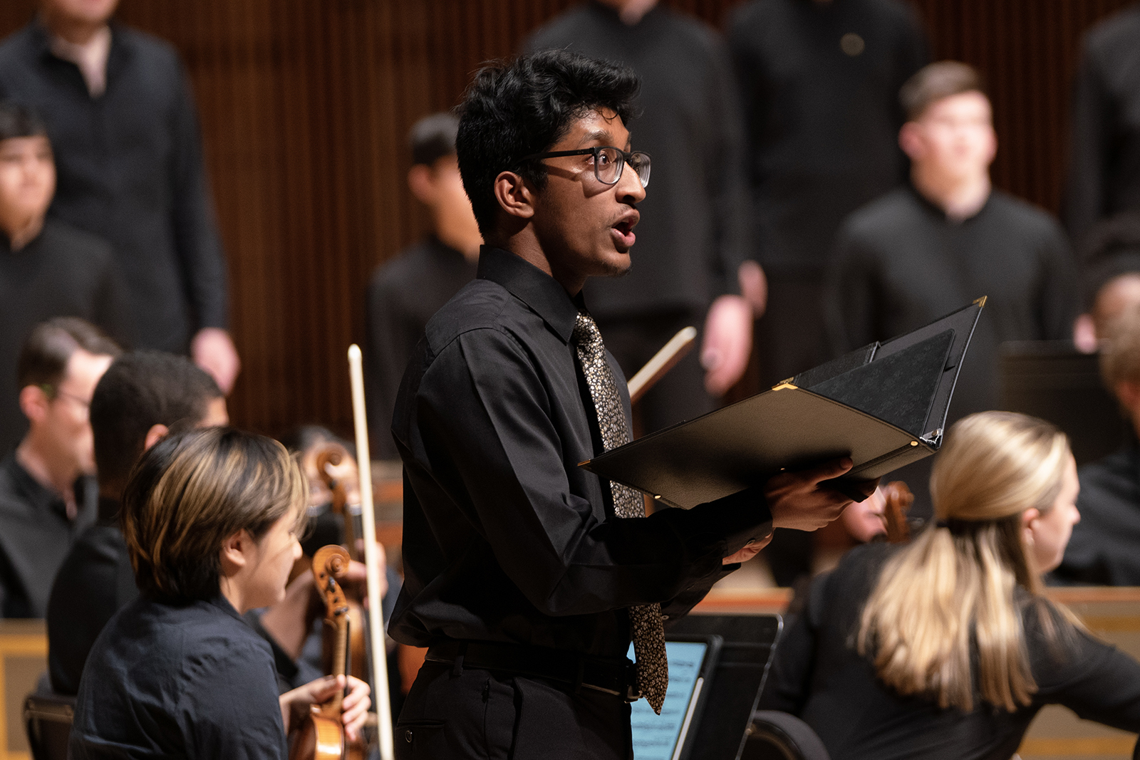 A man sings during a concert.