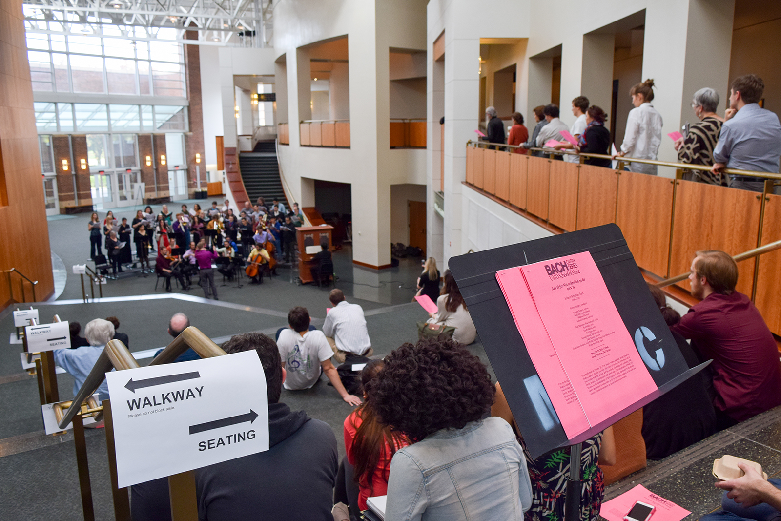 An audience watches a choral performance in The Clarice's Grand Pavilion.