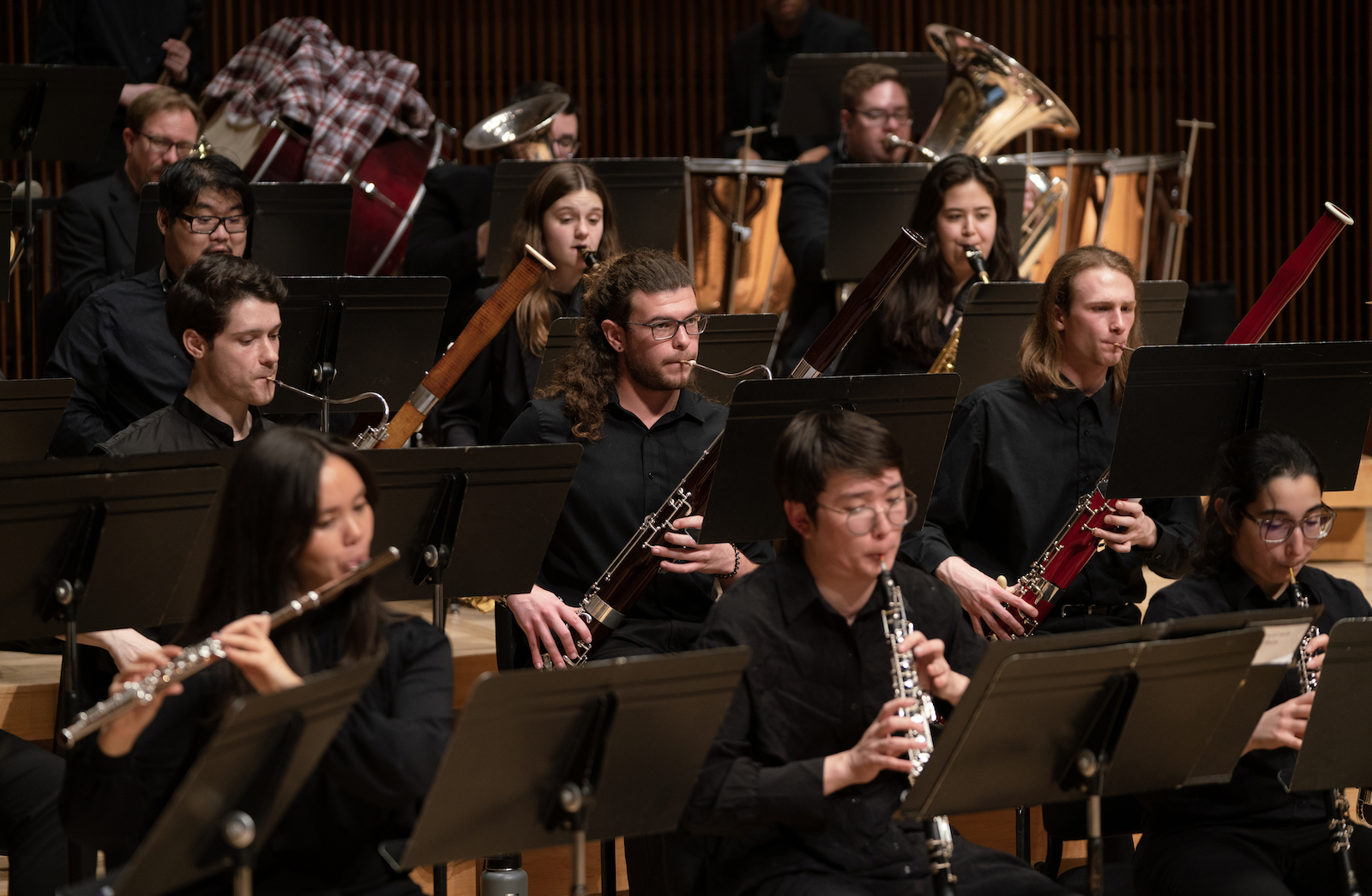 The UMD Wind Orchestra performs on stage.