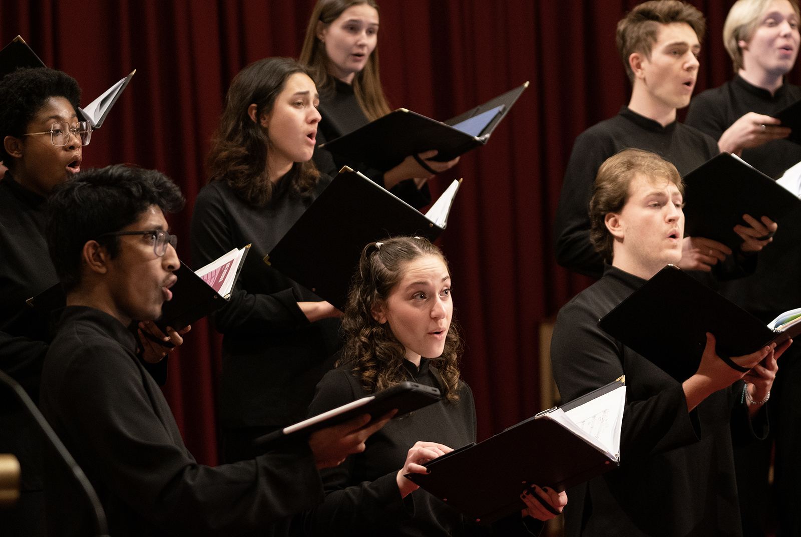 Members of the UMD Chamber Singers sing during a concert.