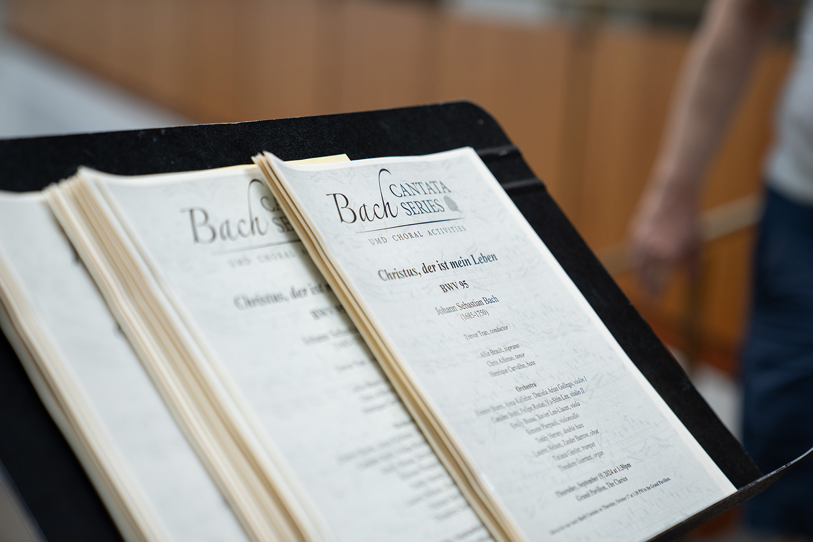 Bach Cantata sheet music display on a music stand.