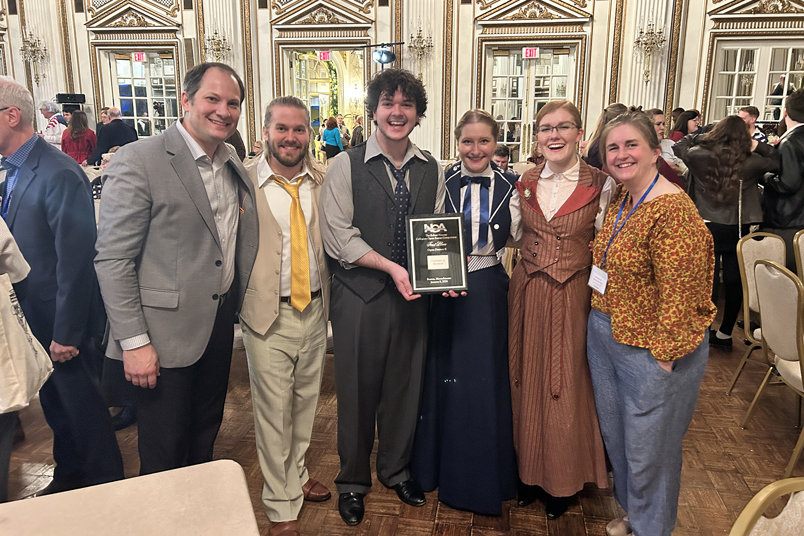 Members of the Maryland Opera Studio pose with their first place plaque. From left to right: J. Bradley Baker, Max Alexander Cook, Bryan Bennett, Alla Salakhova, Meghan Nelson, Corinne Hayes.
