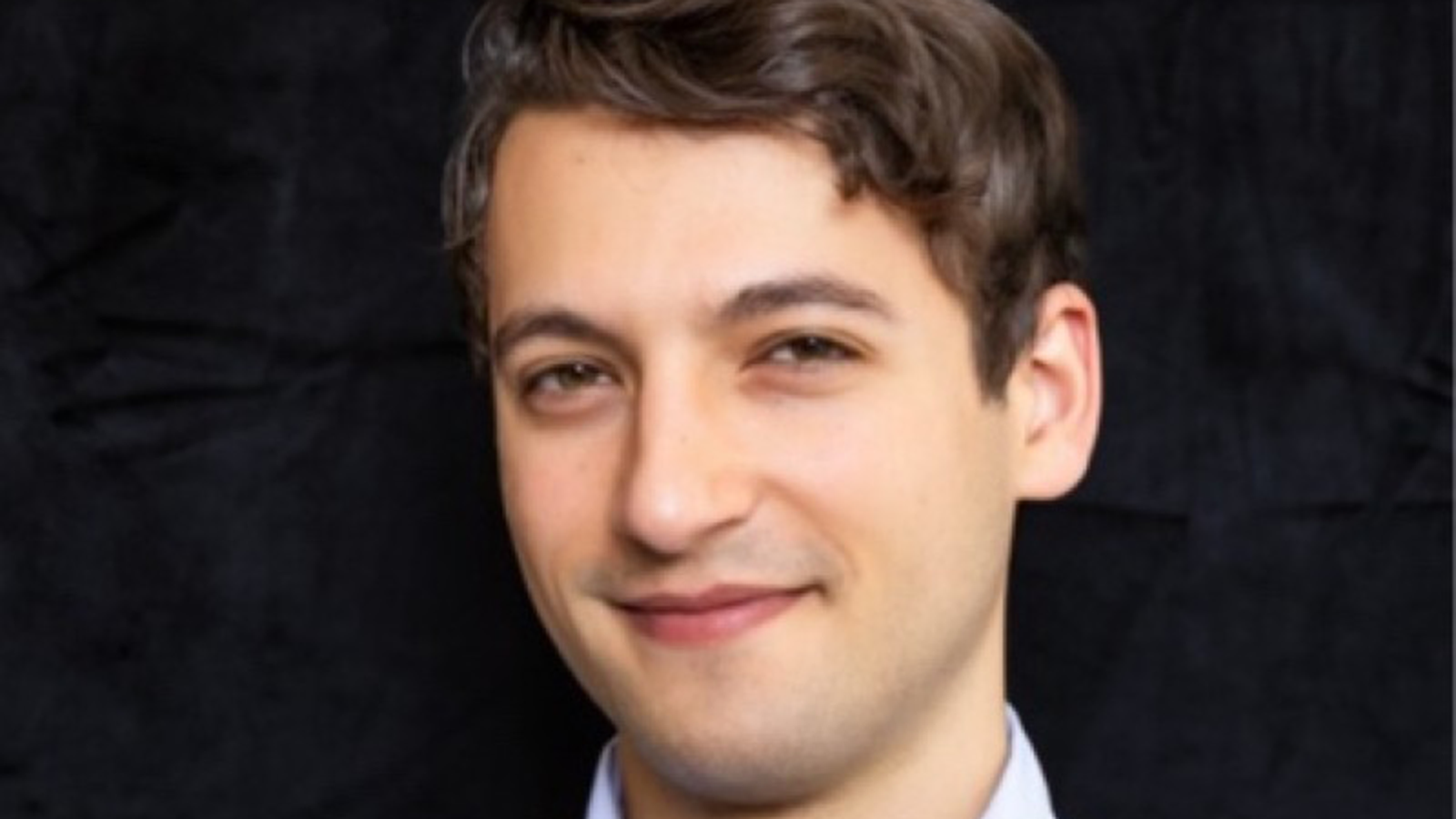 Headshot of Ezra Silver-Isenstadt