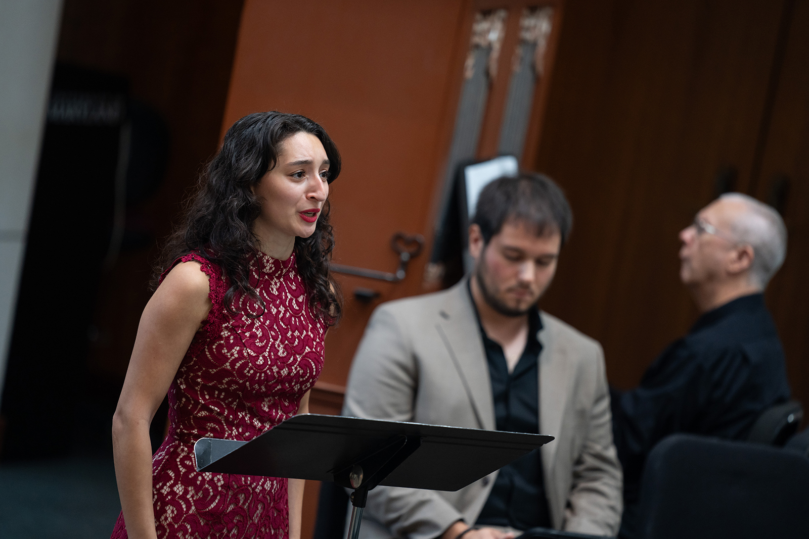 A choral student sings during the Bach Cantata Series.