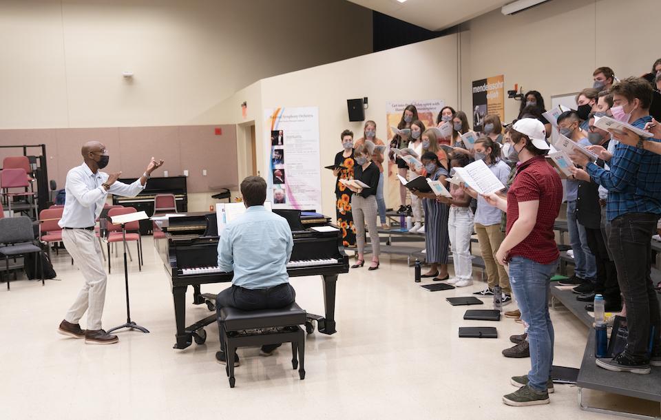  Jason Max Ferdinand teaches a choral rehearsal at UMD.